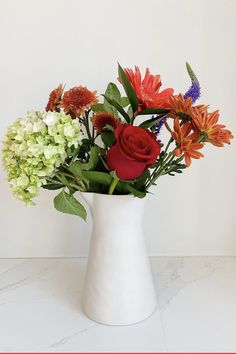 A beautiful, unique vase with beautiful, colorful flowers in it. Vase Flowers, Beautiful Vase, Lovely Things, Consulting Business, New Job, Best Gift, House Warming