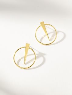 Shot in the Dark Earrings | Gold | Product Image | Uncommon James Edgy Small Hoop Earrings As Gift, Edgy Gold Earrings For Party, Modern Gold Brass Hoop Earrings, Edgy Gold Metal Earrings, Edgy Gold Pierced Earrings, Edgy Gold Hoop Earrings For Pierced Ears, Modern Brass Small Hoop Earrings, Modern Matte Gold Brass Hoop Earrings, Modern Geometric Gold Hoop Earrings