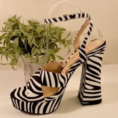 Suede Cross Open Toe Strap With Ankle Wrap Buckle And Wide Bottom Block 5 1/2 Inch Heel High Heel Zebra Print Party Heels, Black High Heels With Zebra Print, Chic Striped High Heel Shoes, Chic Striped High Heel, Chic Striped High Heels, Spring Zebra Print High Heels, Spring Zebra Print Heels, Chic Zebra Print High Heels, Ankle Wrap