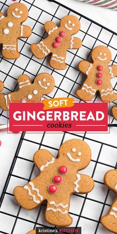 soft gingerbread cookies with white icing and red candies on a cooling rack