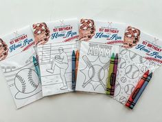 four baseball coloring pages with crayons on them