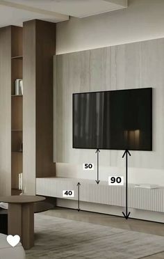 a living room with a large flat screen tv on the wall