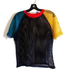 Mesh Tee Features Bright Colored Mesh Sleeves In Yellow And Teal Red Neck Line Best Fit: Medium Never Worn Multicolor Mesh Top For Summer, Multicolor Tops For Summer Streetwear, Black Mesh Crew Neck Top For Summer, Casual Black Mesh Top, Trendy Mesh T-shirt For Summer, Sporty Multicolor Tops For Summer, Sporty Multicolor Summer Tops, Casual Short Sleeve Mesh Top For Streetwear, Black Short Sleeve Mesh Top For Summer