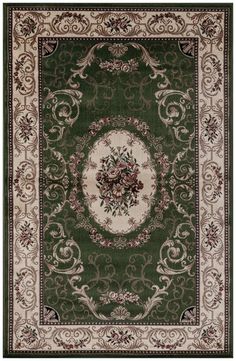 a green rug with white and red flowers on the center, surrounded by ornate scrolls