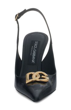 A statement dimensional D&G logo crowns the pointy toe of this stiletto slingback crafted in Italy of glossy calfskin leather. 3 1/2" heel, 88mm (size 8.5) Adjustable slingback strap with buckle closure Leather upper, lining and sole Made in Italy Women's Designer Shoes Luxury Patent Leather Slingback Pumps With Open Heel, Luxury High Heel Patent Leather Slingback Pumps, Luxury Patent Leather High Heel Slingback Pumps, Designer Patent Leather Slingback Pumps With Open Heel, Luxury Patent Leather Slingback Heels, Designer Patent Leather Slingback Pumps With Ankle Strap, Designer Slingback Pumps With Ankle Strap In Patent Leather, Chic Formal Heels With Logo, Designer Patent Leather Slingback Pumps High Heel