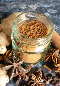 an image of cinnamon spice in a glass jar with star anise on the side