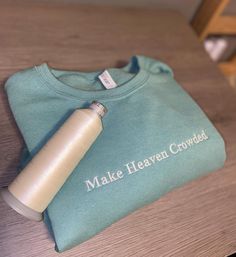 "Make Heaven Crowded" Light sage green crewneck with embroidery  Note: sizing is unisex adult. All of my items are made with care and are machine washable! Green Crew Neck Sweatshirt With Embroidered Text, Crew Cotton Sweatshirt With Machine Embroidery, Cotton Crew Sweatshirt With Machine Embroidery, Crew Neck Cotton Sweatshirt With Machine Embroidery, Green Crew Neck Sweatshirt With Letter Embroidery, Cotton Crew Neck Sweatshirt With Machine Embroidery, Casual Green Sweatshirt With Embroidery, Green Cotton Sweatshirt With Letter Embroidery, Green Crew Neck Sweatshirt With Machine Embroidery