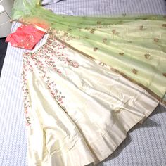 Beautiful Indian White/Cream Lehenga With Matching Pink Blouse And Light Green Dupatta. Only Worn Once For An Engagement Ceremony So This Is Pretty Much Like New. Can Can Underneath The Lehenga For A Stunning Flare. Beautiful Floral Embroidery. Measurements Are Shown In Photos. Price Is Firm Since This Is Pretty Much Like New Off White Traditional Wear For Spring Wedding, Silk Traditional Wear With Traditional Drape For Spring, White Traditional Drape For Spring, White Silk Summer Sets, White Dupatta For Spring With Traditional Drape, White Spring Dupatta In Traditional Drape, White Traditional Dupatta For Spring, White Traditional Drape Dupatta For Spring, Traditional White Dupatta For Spring