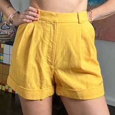 Never Worn. Excellent Condition Racil Wool Shorts. 100% Wool. Two Front Pockets. Back Faux Pockets. Zip Front. 4 Belt Loops. Waist: 26 Inch Rise: 12 Inches Inseam: 3 Inches Outer Seam: 15 Inches Yellow Summer Shorts For Work, Chic Yellow Shorts For Workwear, Yellow Shorts For Workwear In Spring, Yellow Shorts For Spring Workwear, Yellow Workwear Shorts For Spring, Yellow Workwear Bottoms Shorts, Yellow Short Bottoms For Work, Yellow Short Length Bottoms For Workwear, Yellow Short Length Workwear Bottoms