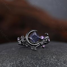 Natural Leaf Branch Engagement Ring Cushion Cut Blue Sandstone Weeding Band, Leaf Ring Set,  Moon Black Gold Ring for Women Main Stone: 7mm Cushion Cut Blue Sandstone. Side Stone: Amethyst Band Width: Approx. 1.6mm Our Services: All sizes are available, if you need other ring sizes, please feel free to contact me. Production Time: Since all rings are handmade according to orders, it takes about 13-15 working days (excluding weekends) to make, and 3-5 working days to arrive, thank you for your understanding. Expedited Order: We provide expedited order service, it takes about 7-10 working days (excluding weekends) to complete the ring, and 3-5 working days to arrive, if you are in a hurry to get the ring, please contact me. Payment Plan: We offer payment plan, you can pay weekly or monthly, Unique Amethyst Ring, Blue Sandstone Engagement Ring, Sandstone Engagement Ring, Moon Rings, Branch Engagement Ring, Ring Moon, Black Gold Ring, Blue Sandstone, Branch Ring