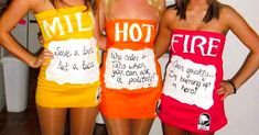 three women dressed in funny costumes posing for the camera