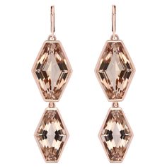 Elegant and exquisitely detailed Cocktail 14K dangle Earrings, center set with exclusively hand cut 27.44 Cts. (approx.) Fancy Hexagon Morganite. Beautifully Hand crafted in 14 Karat Rose Gold. Stone Size: Morganite: 16 x 10 mm, 18x12 mm Gemstone Carat Weight: Morganite: 27.44 Cts. Brith Stone Jewelry Party Wear Ring Anniversary Gift Jewelry Wedding Wear jewelry Birthday Gift jewelry This Beautiful Earring Adds a Touch of Luxury to your Ear. While Remaining Sparkling as Ever. Buy it Now. Studded Earrings, Birthday Jewelry Gift, Wedding Wear, Morganite, Jewelry Party, Anniversary Rings, Stone Jewelry, Beautiful Earrings, Or Rose