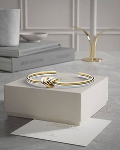 Dual Knot Bangle Polished | Waldor & Co. Bracelets Luxury Metal Bracelets With Plating, Elegant Bangle With Polished Finish As Gift, Elegant Cuff Bracelet With Polished Finish As Gift, Elegant Cuff Bracelet With Polished Finish For Gift, Luxury Adjustable Bangle For Anniversary, Timeless Metal Cuff Bracelet As Gift, Formal Plated Bangle Bracelets, Formal Bangle Bracelets With Plating, Luxury White Gold Cuff Bracelet Gift