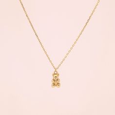 14K Solid Gold Teddy Bear Necklace Please note that this necklace is made to order. S P E C S ♦ All of our jewelry is handmade in our studio in Seoul, Korea. ♦ 14K Solid Gold (available in yellow and rose gold) ♦ Pendant measures about 5mm(W) x 8 mm(H) x 3.5 mm(D) / 0.2 inch (W) x 0.3 inch (H) x 0.14 inch (D) ♦ Listing is for 1 Necklace ♦ The chain is included DESCRIPTION ♦Minimal and simple 14k solid gold teddy bear necklace ♦The pendant is hollow constructed N O T E S *This necklace is made to Yellow Gold Pendant Necklace 16 Inch, Dainty Yellow Gold Necklace 16 Inch, Dainty 16 Inch Yellow Gold Necklace, Rose Gold Plated Necklace For Gift, Handmade 14k Yellow Gold-filled Necklaces, 14k Yellow Gold Necklace For Her, 14k Gold Filled Pendant Necklace, Fine Jewelry 14k Gold Filled Pendant Necklace, 14k Gold Filled Pendant Necklace, Fine Jewelry