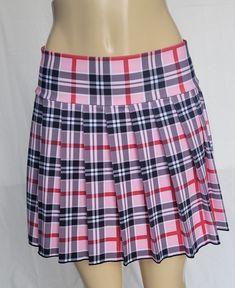 "JUNIOR TO PLUS SIZE \"Strawberry\" PLAID MINI SKIRT 14\"-16\" LONG. TO ENSURE YOU ORDER THE CORRECT SIZE SKIRT, PLEASE READ THIS CAREFULLY; THEN MATCH IT WITH SIZES. ALL OUR SKIRTS ARE ALWAYS MADE WITH A 3\" LONG WAITSBAND + THE LEGNTH OF THE SKIRT. OUR SKIRTS ARE ALL MADE TO ORDER AND THE LENGTH MAY SLIGHTLY CHANGE A FEW CENTIMETERS, BUT WE TRY TO BE AS ACCURATE AS POSSIBLE.  BELOW IF THE FINAL LENGTH OF THE SKIRT. *XSMALL - Waistband measures 28\" around when fully closed. Skirt is 14\" long Trendy School Skort With Stretch, Trendy Stretch Skort For School, Preppy Pink Bottoms For School, Preppy Fitted Short Length Skort, Casual Pink Skort For School, Casual Mini Skirt In Pink, Stretch Mini Skort With Lined Skirt, Trendy Plaid Skirted Skort, Preppy Pink Pleated Skirt For School