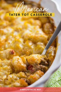 mexican tater tot casserole is shown in a white dish with a spoon