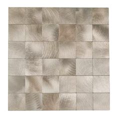 a white and brown tile wall with squares on the bottom, in shades of gray