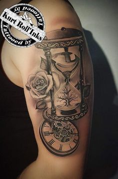 a woman's arm with a clock and roses on it