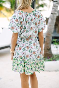 This floral dress is so cute and easy to wear! It's the perfect combination of classy and casual. Which means you can dress this beauty up with heels or down with sandals. Round neckline Short sleeves Tied waist Dual floral print No stretch Poppy is wearing the small. Summer Tropical Print Floral Dress For Garden Party, Summer Floral Dress With Tropical Print For Garden Party, Floral Printed Mini Dress For Brunch, Summer Floral Print Mini Dress For Brunch, Chic Floral Print Mini Dress For Brunch, Chic Floral Mini Dress For Brunch, Chic Floral Print Dress For Day Out, Summer Floral Dress With Tropical Print For Brunch, Chic Mini Dress With Tie Waist For Garden Party