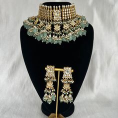 Tyaani inspired Green and Gold Indian / Pakistani Jewellery Set - Choker Necklace and Earrings. Sabyasachi inspired. PACHI KUNDAN (gold plated) We have a large inventory - message us what shade you are looking for or send picture of your outfit to match. Fast shipping - Canada & USA "Life is better ... with a Touch of Elegance". Message for any questions. Bollywood Green Bridal Earrings For Reception, Green Bridal Earrings For Reception On Diwali, Green Bridal Earrings For Reception During Diwali, Green Bridal Earrings For Reception At Diwali, Green Bridal Earrings For Reception And Festivals, Green Meenakari Bridal Earrings For Reception, Elegant Green Lehenga With Stone Work, Green Chandbali Bridal Earrings For Reception, Traditional Pista Green Jewelry For Wedding