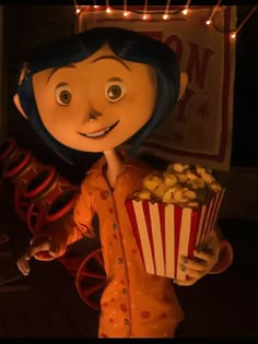 a cartoon character holding a popcorn box and watching the movie