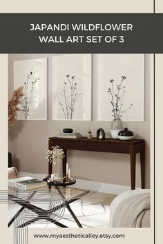 the japanese wildflower wall art set of 3 is displayed in an elegant living room