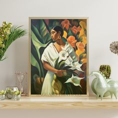 there is a painting on the shelf next to some vases and flowers in front of it