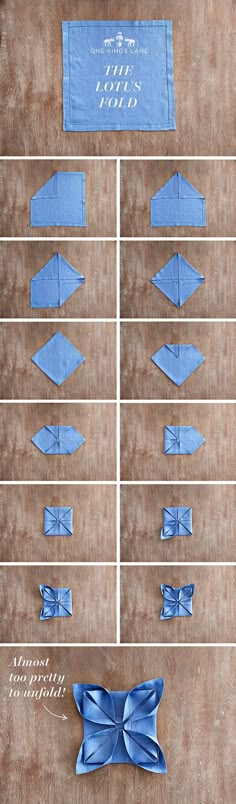 an arrangement of blue paper folded in squares and rectangles on a wooden surface