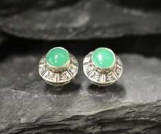 Chrysoprase Earrings set with a Natural Chrysoprase in a top grade & vivid green color with natural inclusions, sourced from Australia, at 10x8mm size, 6 Carats a pair. Bohemian Earrings design made of Solid 925 Sterling Silver ☞ made to last. Click here for ☞ Matching Ring Matching Pendant ☞ please ask me Details:♥ Natural Chrysoprase sourced from Australia & CZ Diamonds♥ Chrysoprase: 10x8mm each, 6 Ct a pair, cabochon cut♥ Lever Back Closure - "English Lock"♥ Length 16mm, Width 14mm♥ Solid 925 Ring Matching, Matching Ring, Boho Green, 925 Silver Earrings, Matching Rings, Bohemian Earrings, Cz Diamond, Boho Earrings, Earrings Set