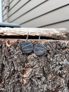 These earrings are hand-sawn out of sterling silver and soldered to another layer of sterling silver as a backdrop to the ravens. They are finished in a rustic, oxidized brushed patina to bring out the details.  These earrings measure 3/4" in diameter and hang from hand-wrapped sterling earwires. Marked 'STERLING' and 'BEZEL' on the back. These earrings will come packaged in a cute kraft gift box. / / / Any questions, feel free to contact me! Rustic Sterling Silver Earrings, Rustic Hand Forged Silver Earrings, Crows Ravens, Hand Saw, Kraft Gift Boxes, Hand Wrap, Etsy Earrings Dangle, Ravens, Jewelry Earrings Dangle