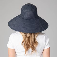 Look stylish and stay protected from the sun with Newport's 6-way Round Crown Sun Hat. This fashionable hat is composed of 75% paper and 25% polyester, protecting you with a UPF 50+ rating. The adjustable brim is 6.25" wide and the hat is 57cm in size. Choose from three colors: brown, natural, and blue. Worthy of any outdoor adventure, this hat can be styled 6-ways for any occasion. Features: Colors: Brown, Natural, & Blue Material: 75% Paper, 25% Polyester Brim Size: 6.25" Size: 57cmSun Protect Wide Brim Hat Summer, Sand Collection, Outdoor Cap, Hat Clips, Summer Favorites, Scarf Poncho, Colors Brown, Beach Hat, Dress Hats