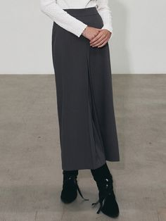 Editor's NotesInverted Banding Long Skirt is bendable long skirt highlighting a trendy silhouette. Mixed polyester and span material that comfortable and stretchable skirt.- Relaxed fit with front pleat details- Back banding comfortable wearable- Items that can be matched with various tops on a daily basisMeasurements(in.)Size: One size- Waist: 12.2 in. - Hip: 18.9 in.  - Hem: 24.4 in. - Length: 35 in. *Model info: Height 5ft 7. / Bust: 31.5 in. / Waist: 22.8 in. / Hip: 34.6 in. Composition & Care- 95% POLYESTER 5% SPAN- Please check the care label- High density cotton 100% material with high density and solid weight.- Bio-washing processing soft and pleasant wearability and minimizing reduction.- Premium fabric with good organization and durability.- Depending on the monitor color and Workwear Asymmetrical Maxi Skirt With Pleats, Asymmetrical Workwear Maxi Skirt With Pleats, Asymmetrical Pleated Maxi Skirt For Work, Versatile Long Lined Skirt, Asymmetrical Pleated Maxi Skirt, Pleated Asymmetrical Maxi Skirt, Asymmetrical Relaxed Maxi Skirt With Elastic Waistband, Flared Lined Skirt With 4-way Stretch, Asymmetrical Maxi Skirt With Elastic Waistband