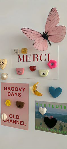 there are many different magnets on the wall