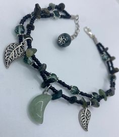 Double strand anklet featuring green aventurine crystal moon, mossy agate on extender, tourmaline crystals and green ghost Quartz with silver leaves. Mossy Agate, Green Ghost, Green Aventurine Crystal, Crystal Moon, Aventurine Crystal, Silver Leaves, Green Fits, Green Jewelry