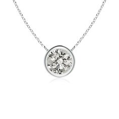 This bezel-set pendant necklace, crafted in 18k white gold, is a perfect mix of extravagance and simplicity. The solitaire diamond pendant is attached to the chain by the loops. Cut in a classic round shape, the diamond shines with unmatched brilliance. Choose from different stone qualities (K, I3, I-J, I1-I2, H, SI2, GH VS) and multiple total carat weight options. Solitaire Diamond Pendant, Solitaire Necklace, Solitaire Pendant Necklace, Diamond Solitaire Necklace, Solitaire Necklaces, Solitaire Diamond, Solitaire Pendant, Diamond Pendant Necklace, Diamond Solitaire