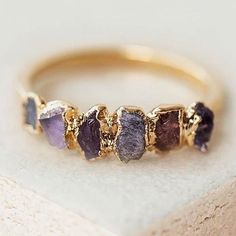 PURPLE OMBRÉ BIRTHSTONE RING! The Crystals: Amethyst, spinel, pink sapphire, and tanzanite Birthstones: February, August, September, and December Good Vibes: Clarity, balance, royalty. #birthstonejewelry #bohostyle #crystaljewelry #gemstonejewelry #Regram via @www.instagram.com/p/B--O_peBs8D/ Purple Gemstone Rings For Jewelry Making, Unique Amethyst Rings With Gemstone Accents, Fine Jewelry With Purple Stones, Purple Stones Fine Jewelry, Fine Purple Amethyst Jewelry, Fine Jewelry Amethyst Crystal Ring With Gemstone Accents, Gold Amethyst Jewelry With Accent Stones, Gold Amethyst Crystal Ring With Gemstone, Purple Amethyst Multi-stone Rings