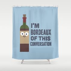 a blue shower curtain with an image of a bottle that says i'm bordeauxux of this conversation