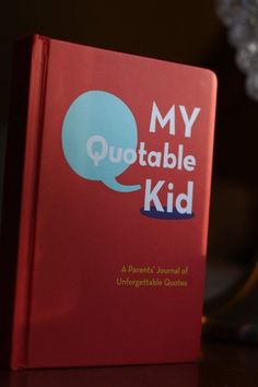 a red book sitting on top of a table