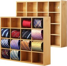 two wooden shelves filled with different types of ties