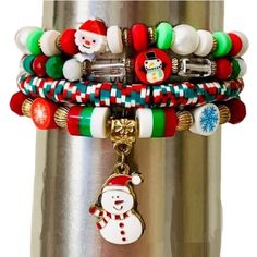 These Festive Christmas Bracelets Add Holiday Cheer With Every Jingle. Perfect For The Person Whose Spirit Animal Is A Snowman Or Santa. Enjoy The Stretchy Comfort And Just Be Careful Not To Frighten The Cat With All The Charm Dangling. Christmas Themed Stackable Bracelets, Set Of 4 Size: Os, Bracelets Have A Circumference Of Approximately 6.8 Inches When Unstretched. Condition: New Set Of 4 Bracelets Christmas-Themed Beads Snowman And Santa Charms Stretchy Elastic Fit Multicolor Design: Red, Wh Bracelets Christmas, Multicolor Bracelet, Holiday Bracelets, Bracelets Set, Christmas Bracelet, Jewelry Beaded, Stackable Bracelets, Sell Gold, Christmas Jewelry