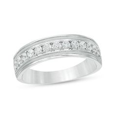 a white gold wedding band with diamonds