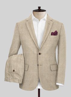 Create a stylish and chic impression with our Highlander Heavy Beige Houndstooth Tweed Suit. Crafted from pure wool fabric, it exudes confidence and expresses your unique individuality through the sophisticated charm of its timeless beige color, complemented by the classic houndstooth pattern. The suit offers a versatile option to make a lasting impact at the office, weddings, and other special occasions. 
  Look Includes    Highlander     Heavy   Beige   Houndstooth     Tweed  Fabric  Two Butto Beige Wool Suits For Professional Tailoring, Beige Wool Suits For Tailoring, Tailored Beige Tweed Jacket For Business, Fitted Beige Tweed Jacket For Business, Tailored Beige Tweed Jacket With Suit Collar, Tailored Beige Wool Suit, Luxury Tweed Suit With Notch Lapel, Beige Wool Suit For Semi-formal Occasions, Beige Wool Suits For Semi-formal Occasions