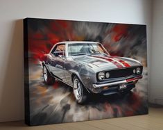 a painting of a muscle car on a wall