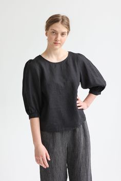 "Loose linen blouse. Relaxed fit round neckline blouse. Light, breathable and super clean - this puff-sleeved blouse is a must-have during the warm season. Here simplicity really is the key: it gives you the room for pairing it with anything - skirts, pants, shorts, flats, heels, espadrilles... you name it. ABOUT US LINEN ID was born from desire to embrace things that actually matter. We aim to create sustainable garments that offer uncompromised design, are versatile and stay with You as time p Round Neckline Blouse, Poet Blouse, Female Poets, Linen Top Women, Linen Shirts Women, Linen Blouse, Organic Linens, Linen Top, Sustainable Clothing