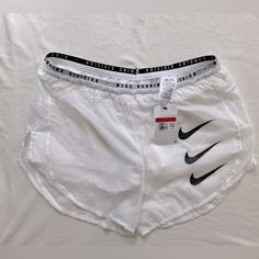 Color White Size L Running Shorts White Nike Athletic Shorts For Summer, Nike White Short Leg Bottoms, White Nike Bottoms For Beach, White Workout Bottoms For Summer, Summer Sports Shorts In White, White Summer Sports Shorts, Grey Nike Pros, Black Nike Pros, Nike Spandex