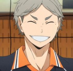 an anime character with grey hair and orange shirt smiling at the camera while he looks to his left