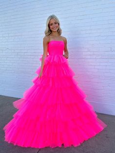 This princess ball gown features a strapless straight neckline, slim-fit bodice and layered skirt. This is a wow gala gown that people will remember when you enter. Slim-fit bodice Tulle floor-length Layered skirt Layered Tulle Prom Dress, Tulle Prom Dress Long, Quincenera Dresses, Hot Pink Prom Dress, Strapless Ball Gown, Tulle Neckline, Tulle Prom Dresses, Prom Inspiration, Pink Ball Gown