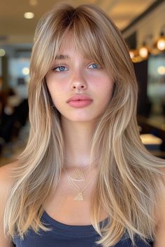 Elevate your style with 38 easy-to-maintain medium-length hairstyles featuring bangs—effortlessly chic and practical! ✨💇‍♀️ #MediumLengthHair #HairstylesWithBangs #EasyMaintenance #ChicLooks #HairInspiration #EffortlessStyle Bangs With Round Face Long Hair, 90s Bubble Bangs, Blonde Hair With Full Bangs, Golden Blonde With Bangs, Long Layered Hair With Fringe Bangs, Blonde With Fringe Bangs, Choppy Fringe Bangs, Semi Bangs, Models With Bangs