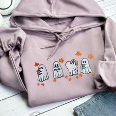 spooky season,Halloween Sweatshirt,Spooky Season,halloween shirt,embroidered,halloween sweatshirt,embroidered sweater,halloween,Halloween Embroidery,halloween gift,pumpkin sweatshirt,Halloween Crewneck,oversized sweatshirt,embroidery,trendy,Halloween University,Ghost Crewneck,fall sweater,Funny Halloween,gifts for her The fabric of the clothing is made up of 80% cotton and 20% polyester, and it is available in 23 different colors. Important Notes: The price listed is for one sweatshirt/hoodie/t- Halloween Embroidery Hoodies, Ghost Crewneck, Halloween University, Ghost Reading Book, Embroidered Ghost, Halloween Sweaters, Embroidery Halloween, Embroidered Halloween, Ghost Reading