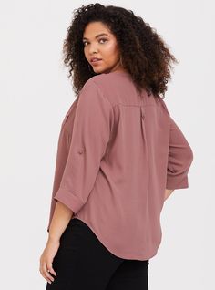 Made from a crisp and fluid fabric, the Harper lends graceful movement to a polished look that's boardroom to brunch approved. Georgette fabric. Split neck with concealed buttons. 3/4 length tab sleeves. Chest pockets. Shirttail hem. CONTENT + CARE: Polyester. Wash cold; dry flat. Imported plus size tops. SIZE + FIT: Model is 5'11”, size 1. Size 2 measure 30” from shoulder. The best plus size women's harper georgette pullover 3/4 sleeve blouse the in brown made of georgette. These dressy clothes and work-wear, office-wear, career-wear, and business-wear will make you look professional to nail your job interview and wear to work every day. Solid Blouse With Rolled Sleeves For Work, Fall Office Blouse With Rolled Sleeves, Solid Workwear Blouse With Rolled Sleeves, Office Blouse With Roll-up Sleeves For Fall, Fall Office Blouse With Roll-up Sleeves, Workwear Blouse With Rolled Sleeves, Half Sleeve Blouse With Button Closure For Work, Versatile Blouse With Rolled Sleeves For Work, Solid Color Workwear Tops With 3/4 Sleeves